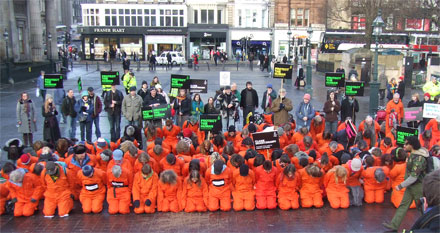 EIS members & supporters outside Telford College gate in the rain
