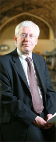A dark suited Mark Lazarowicz in the offices of the Parliamentary Labour Party in Westminster