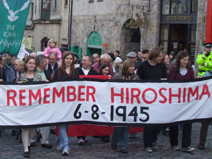 Marchers up the Royal Mile with a Remember Hiroshima 6-8-1945 banner