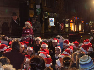 Sandy Campbell of Leith Festival watches the Choir of St. Mary's Primary School