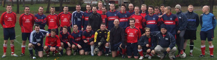 The combined forces of Redpath Albion (in red) and the Albion veterans taken prematch in Pilrig Park