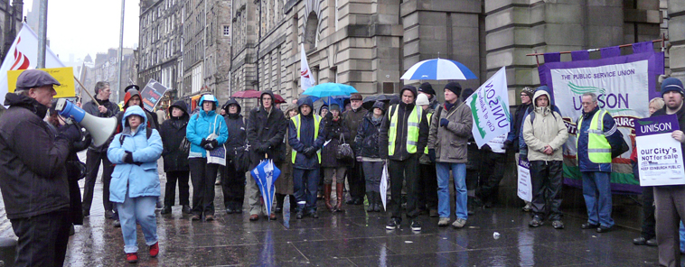 Malcolm Chsholm with loud hailer talking to UNISON members outside City of Edinburgh Council Chambers