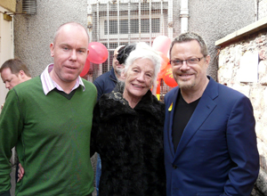 Simon in a green sweater, Mary in a black coat and Eddie in a blue jacket
