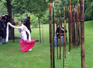 Chang Zhang dancing towards the bamboo shoots