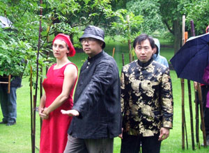 Anne-Marie, Cheng-Ying and a musician start their procession
