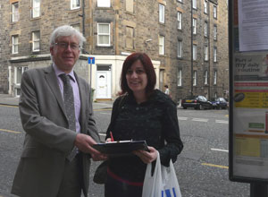 Mark with local commuter Laura, signing the petiton in Broughton Rd