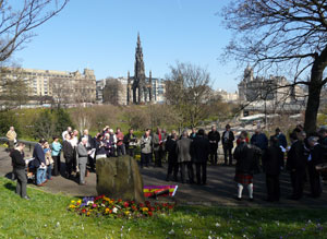 View of the gathering, from behind the memorial, looking over Princes St Gardens to the Scott Monument