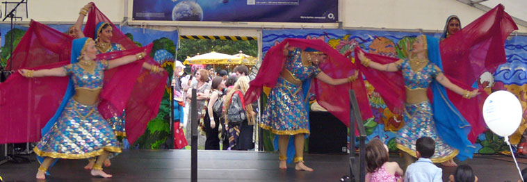 Desi Bravehearts in blue dresses with silver and gold decorations using magenta coloured veils