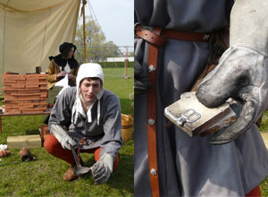 Split view of a crouching man pouring molten metal into a mould , and his gloved hand showing the buckle he has just made