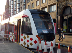 Front view of the tram gleaming in the evening sun