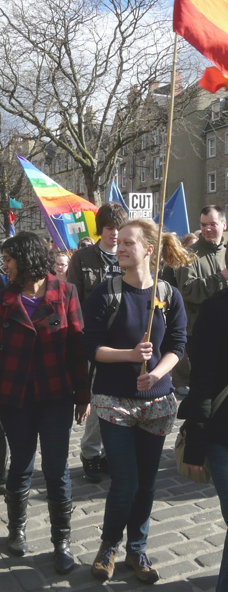 People ambling along the Grassmarket