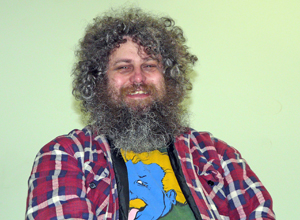 Dave seated grinning